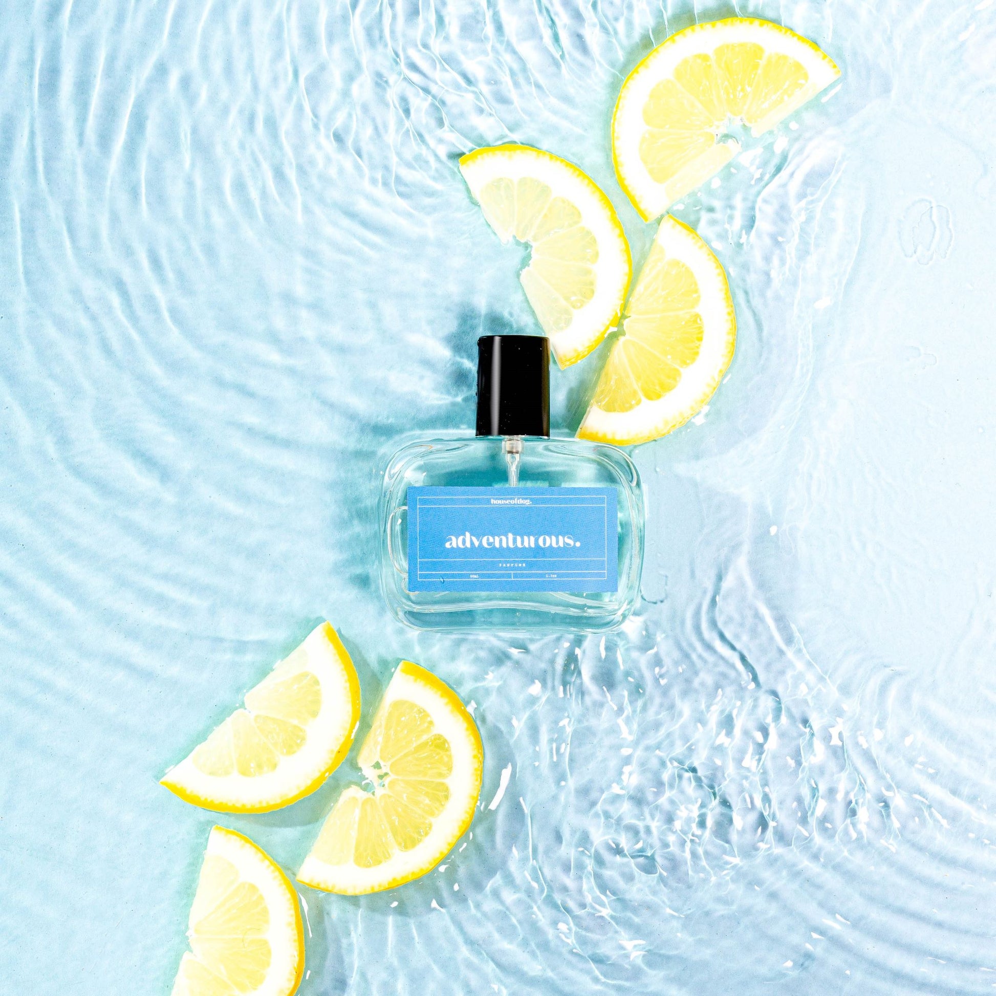 adventurous perfume for dogs by houseofdog. image has water flowing to indicate fresh scent
