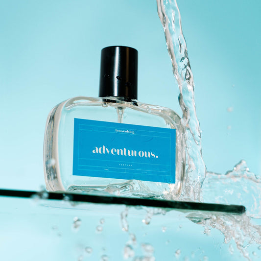 adventurous perfume for dogs by houseofdog. image has water flowing to indicate fresh scent